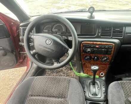 Червоний Опель Вектра, об'ємом двигуна 2.5 л та пробігом 300 тис. км за 2364 $, фото 4 на Automoto.ua