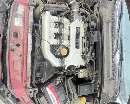 Червоний Опель Вектра, об'ємом двигуна 2.5 л та пробігом 300 тис. км за 2364 $, фото 5 на Automoto.ua