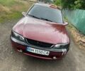 Красный Опель Вектра, объемом двигателя 1.7 л и пробегом 400 тыс. км за 2250 $, фото 1 на Automoto.ua