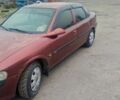 Червоний Опель Вектра, об'ємом двигуна 1.6 л та пробігом 230 тис. км за 2300 $, фото 1 на Automoto.ua