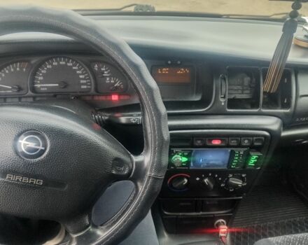 Червоний Опель Вектра, об'ємом двигуна 1.6 л та пробігом 230 тис. км за 2300 $, фото 7 на Automoto.ua