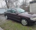 Красный Опель Вектра, объемом двигателя 2 л и пробегом 350 тыс. км за 700 $, фото 1 на Automoto.ua