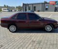 Красный Опель Вектра, объемом двигателя 2 л и пробегом 444 тыс. км за 2000 $, фото 3 на Automoto.ua