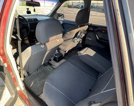 Красный Опель Вектра, объемом двигателя 2 л и пробегом 444 тыс. км за 2000 $, фото 8 на Automoto.ua