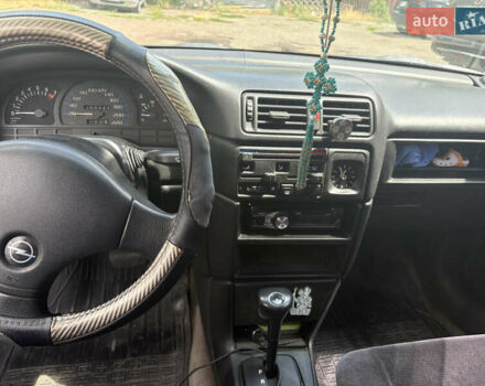 Красный Опель Вектра, объемом двигателя 2 л и пробегом 290 тыс. км за 3000 $, фото 1 на Automoto.ua