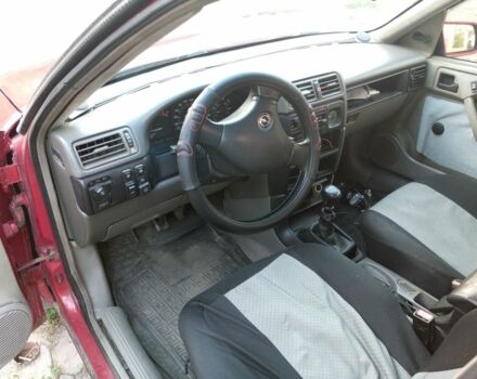 Красный Опель Вектра, объемом двигателя 2 л и пробегом 450 тыс. км за 600 $, фото 5 на Automoto.ua