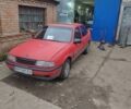 Красный Опель Вектра, объемом двигателя 1 л и пробегом 300 тыс. км за 1300 $, фото 1 на Automoto.ua