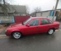 Червоний Опель Вектра, об'ємом двигуна 1.7 л та пробігом 242 тис. км за 1300 $, фото 1 на Automoto.ua