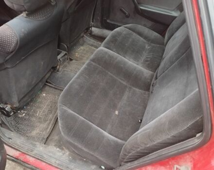 Красный Опель Вектра, объемом двигателя 1 л и пробегом 300 тыс. км за 1300 $, фото 4 на Automoto.ua