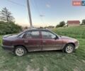 Красный Опель Вектра, объемом двигателя 2 л и пробегом 263 тыс. км за 702 $, фото 1 на Automoto.ua