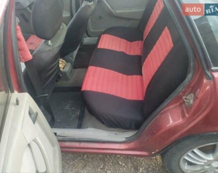 Червоний Опель Вектра, об'ємом двигуна 1.7 л та пробігом 242 тис. км за 1300 $, фото 5 на Automoto.ua