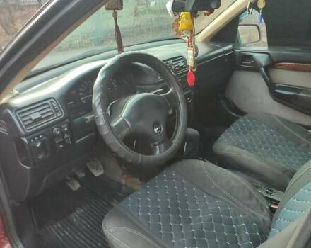 Красный Опель Вектра, объемом двигателя 1.8 л и пробегом 200 тыс. км за 1400 $, фото 4 на Automoto.ua