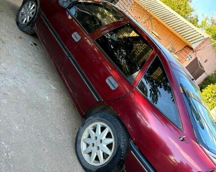 Красный Опель Вектра, объемом двигателя 2 л и пробегом 300 тыс. км за 1250 $, фото 3 на Automoto.ua