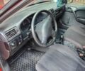 Красный Опель Вектра, объемом двигателя 1.6 л и пробегом 301 тыс. км за 1600 $, фото 4 на Automoto.ua