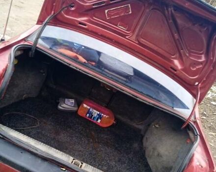 Красный Опель Вектра, объемом двигателя 1.8 л и пробегом 300 тыс. км за 1294 $, фото 7 на Automoto.ua