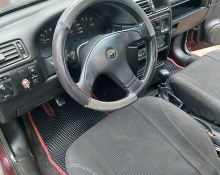 Красный Опель Вектра, объемом двигателя 1.8 л и пробегом 200 тыс. км за 650 $, фото 8 на Automoto.ua