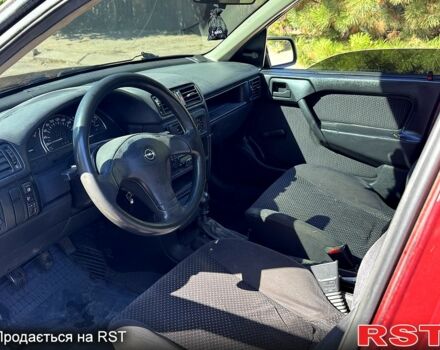 Красный Опель Вектра, объемом двигателя 1.6 л и пробегом 300 тыс. км за 1650 $, фото 1 на Automoto.ua