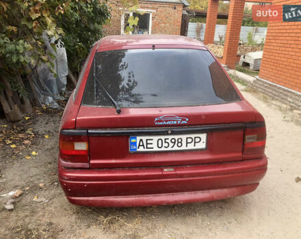 Опель Вектра 1993 в Никополе на Automoto.ua Красный Опель Вектра, объемом двигателя 2 л и пробегом 443 тыс. км за 500 $, фото 1 на Automoto.ua