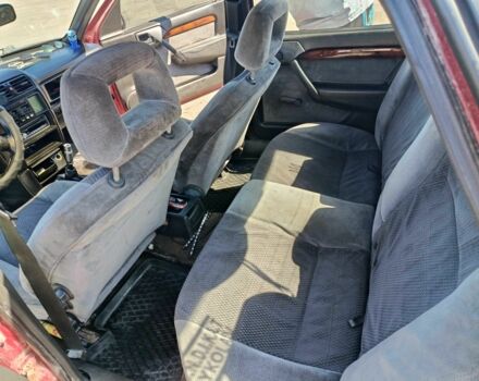 Красный Опель Вектра, объемом двигателя 2 л и пробегом 254 тыс. км за 1450 $, фото 9 на Automoto.ua