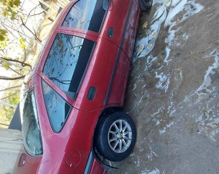 Красный Опель Вектра, объемом двигателя 1.6 л и пробегом 304 тыс. км за 1300 $, фото 3 на Automoto.ua