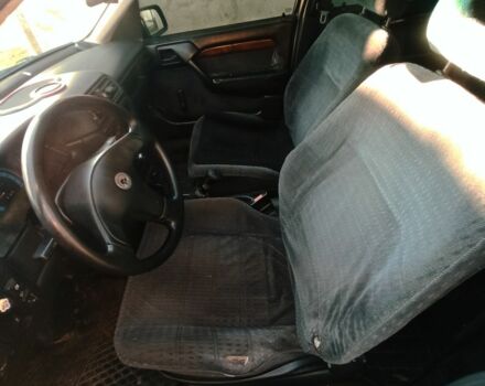 Красный Опель Вектра, объемом двигателя 2 л и пробегом 264 тыс. км за 1000 $, фото 6 на Automoto.ua