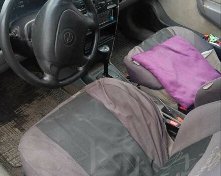 Красный Опель Вектра, объемом двигателя 1.8 л и пробегом 270 тыс. км за 1500 $, фото 4 на Automoto.ua