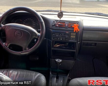 Красный Опель Вектра, объемом двигателя 1.6 л и пробегом 336 тыс. км за 2000 $, фото 6 на Automoto.ua