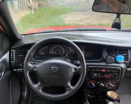 Красный Опель Вектра, объемом двигателя 2 л и пробегом 259 тыс. км за 3200 $, фото 10 на Automoto.ua