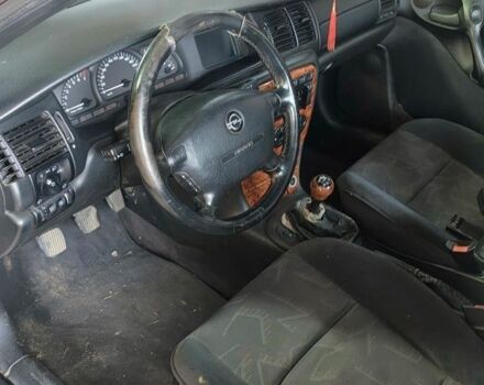 Красный Опель Вектра, объемом двигателя 0 л и пробегом 300 тыс. км за 308 $, фото 5 на Automoto.ua