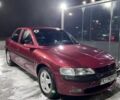Червоний Опель Вектра, об'ємом двигуна 2 л та пробігом 267 тис. км за 2500 $, фото 1 на Automoto.ua