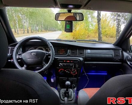 Красный Опель Вектра, объемом двигателя 1.8 л и пробегом 347 тыс. км за 1699 $, фото 2 на Automoto.ua