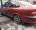 Красный Опель Вектра, объемом двигателя 1.6 л и пробегом 300 тыс. км за 2000 $, фото 3 на Automoto.ua