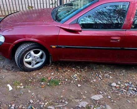 Красный Опель Вектра, объемом двигателя 1.8 л и пробегом 328 тыс. км за 3600 $, фото 1 на Automoto.ua