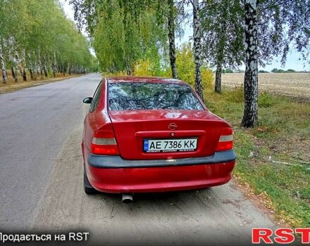 Красный Опель Вектра, объемом двигателя 1.8 л и пробегом 347 тыс. км за 1699 $, фото 1 на Automoto.ua