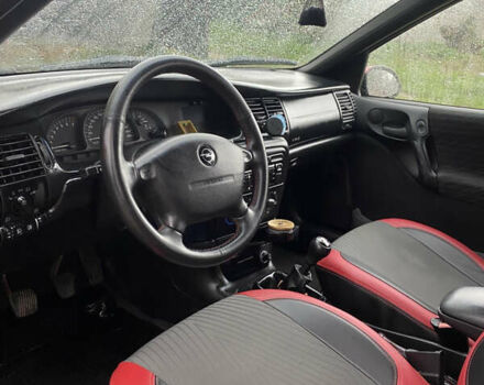 Красный Опель Вектра, объемом двигателя 2 л и пробегом 259 тыс. км за 3200 $, фото 9 на Automoto.ua