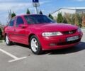 Красный Опель Вектра, объемом двигателя 1.6 л и пробегом 260 тыс. км за 2080 $, фото 1 на Automoto.ua