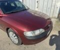 Красный Опель Вектра, объемом двигателя 1.6 л и пробегом 348 тыс. км за 1250 $, фото 1 на Automoto.ua