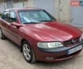 Красный Опель Вектра, объемом двигателя 1.8 л и пробегом 260 тыс. км за 1850 $, фото 1 на Automoto.ua