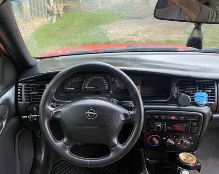 Червоний Опель Вектра, об'ємом двигуна 2 л та пробігом 259 тис. км за 3000 $, фото 5 на Automoto.ua
