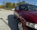 Красный Опель Вектра, объемом двигателя 1.8 л и пробегом 200 тыс. км за 1557 $, фото 1 на Automoto.ua