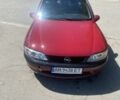 Красный Опель Вектра, объемом двигателя 1.6 л и пробегом 300 тыс. км за 1801 $, фото 1 на Automoto.ua
