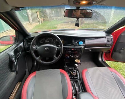 Красный Опель Вектра, объемом двигателя 2 л и пробегом 259 тыс. км за 3200 $, фото 12 на Automoto.ua