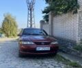 Красный Опель Вектра, объемом двигателя 1.6 л и пробегом 400 тыс. км за 2500 $, фото 1 на Automoto.ua