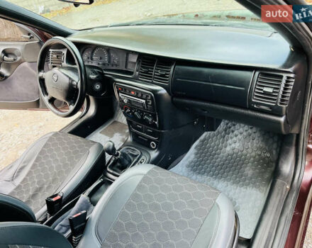 Опель Вектра 1997 в Каменское - Днепродзержинск на Automoto.ua Красный Опель Вектра, объемом двигателя 1.78 л и пробегом 350 тыс. км за 3499 $, фото 24 на Automoto.ua