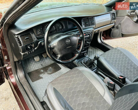 Опель Вектра 1997 в Каменское - Днепродзержинск на Automoto.ua Красный Опель Вектра, объемом двигателя 1.78 л и пробегом 350 тыс. км за 3499 $, фото 21 на Automoto.ua