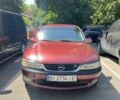 Красный Опель Вектра, объемом двигателя 1.8 л и пробегом 583 тыс. км за 2011 $, фото 1 на Automoto.ua