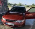 Красный Опель Вектра, объемом двигателя 1.8 л и пробегом 160 тыс. км за 502 $, фото 1 на Automoto.ua