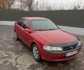 Красный Опель Вектра, объемом двигателя 1.6 л и пробегом 357 тыс. км за 1900 $, фото 3 на Automoto.ua