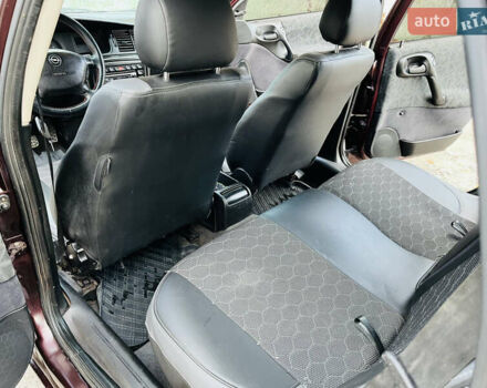 Опель Вектра 1997 в Каменское - Днепродзержинск на Automoto.ua Красный Опель Вектра, объемом двигателя 1.78 л и пробегом 350 тыс. км за 3499 $, фото 27 на Automoto.ua