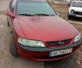 Красный Опель Вектра, объемом двигателя 1.6 л и пробегом 260 тыс. км за 2500 $, фото 1 на Automoto.ua